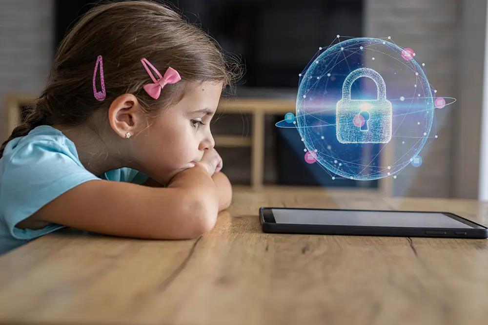 Girl looking at a tablet with a digital security lock icon